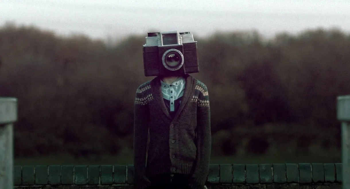 The Boy with a Camera for a Face