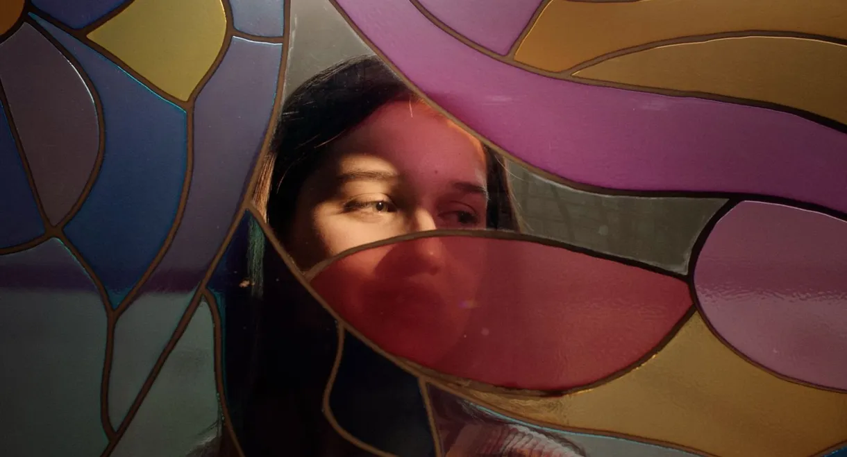 Cracks run through this multicolored glass