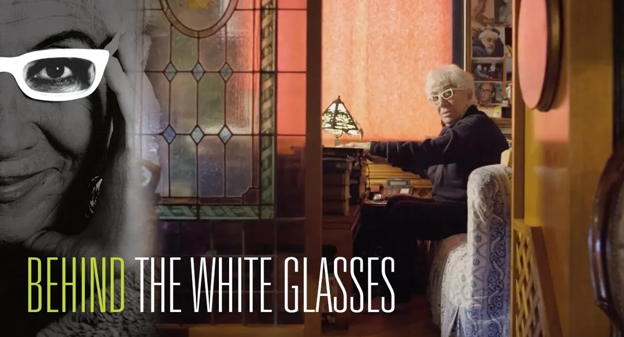 Behind the White Glasses