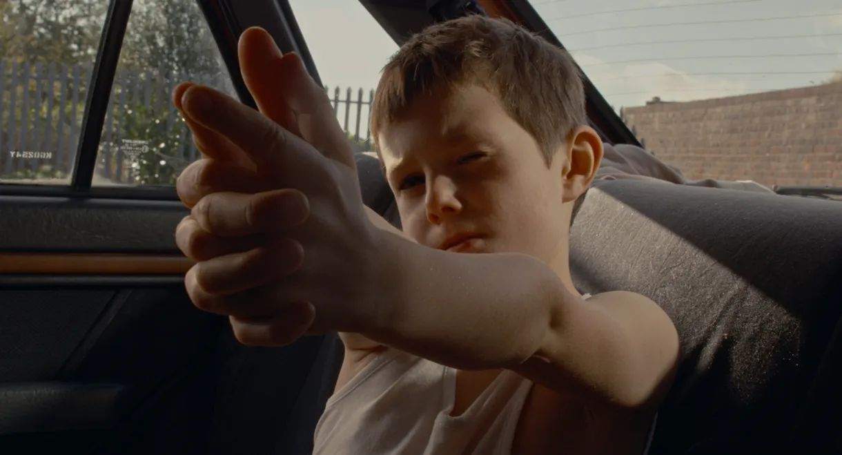 Boy in the Back Seat