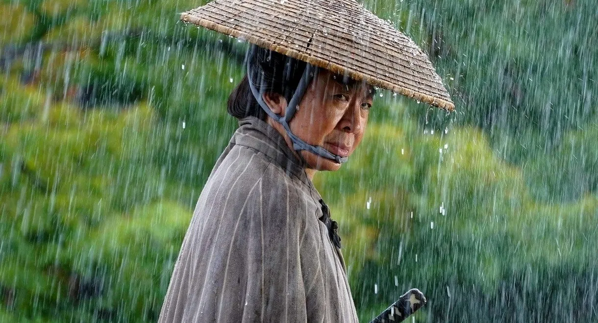 Neck Bowed in the Rain