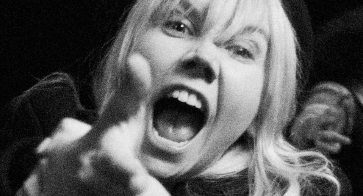 A Woman Walks Into A Bank