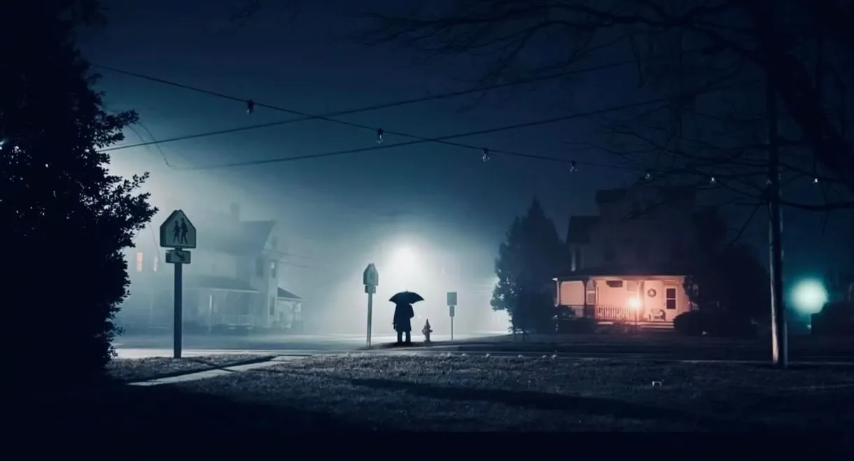 The Man with the Black Umbrella