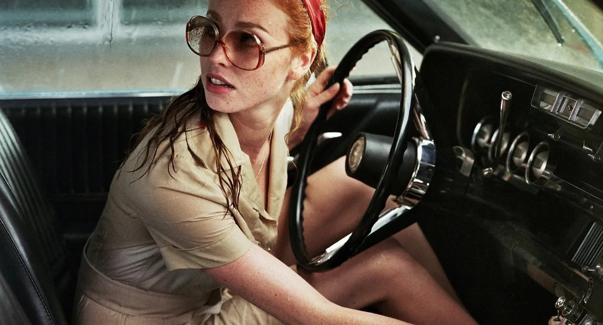 The Lady in the Car with Glasses and a Gun